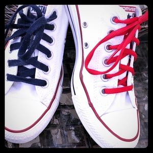 White Chuck Taylor tennis shoes. Good condition.